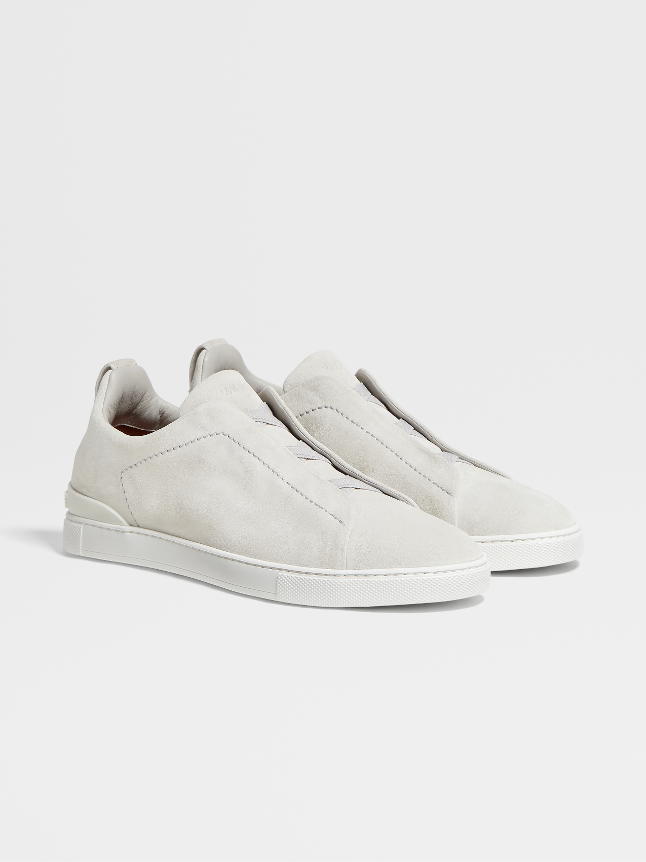 Off White Suede Triple Stitch™ Low Top Sneakers